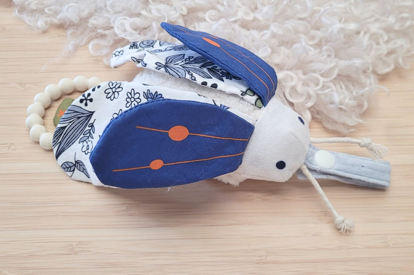 SNUGGLE PAL BANJO BEETLE WITH SILICONE TEETHING RING