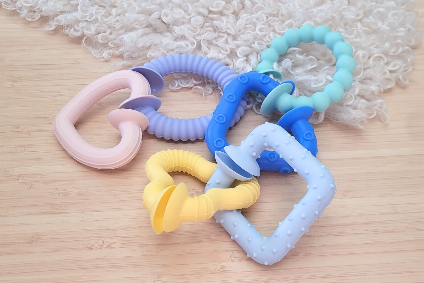 SILICONE SNAP & LEARN SENSORY TEETHERS
