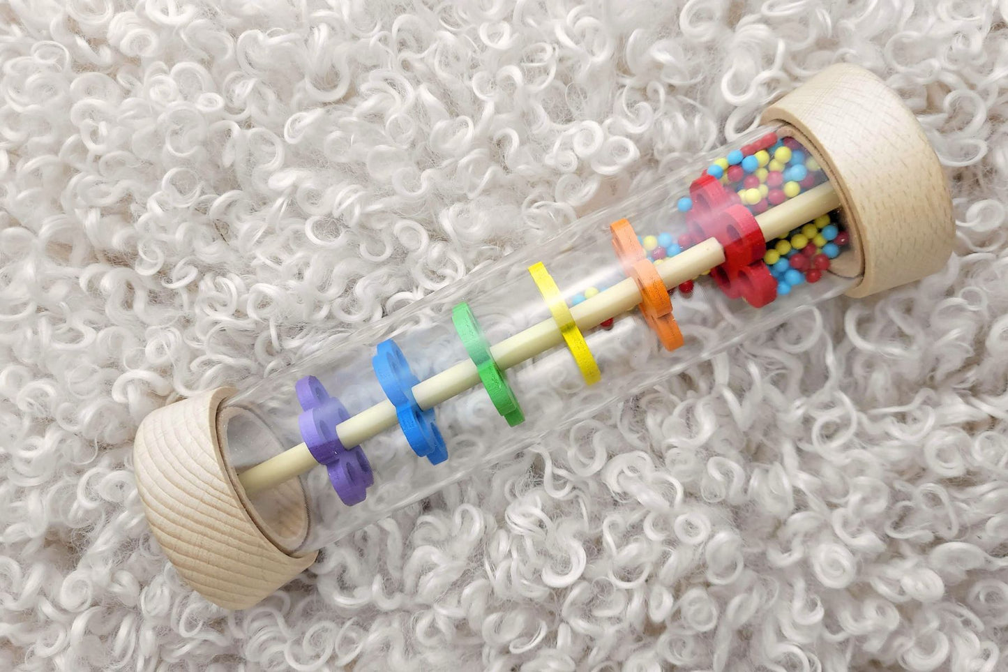 PRICE FOR ONE WOODEN RAINMAKER RATTLE IN CLEAR TUBE